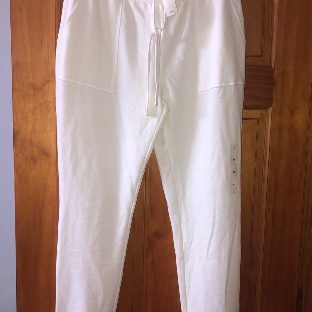 Women’s white sweatpants with deep front pockets & drawstring